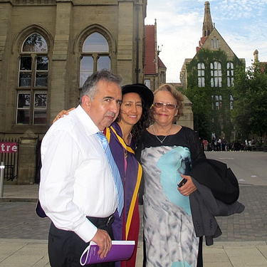 Back with her feet on the ground, here's Ximena enjoying graduation. 