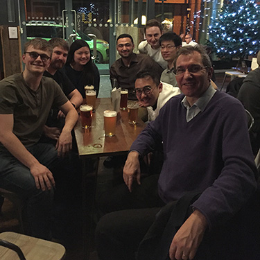 With his research group on a Christmas outing