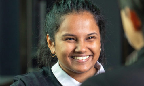 Nainike smiling