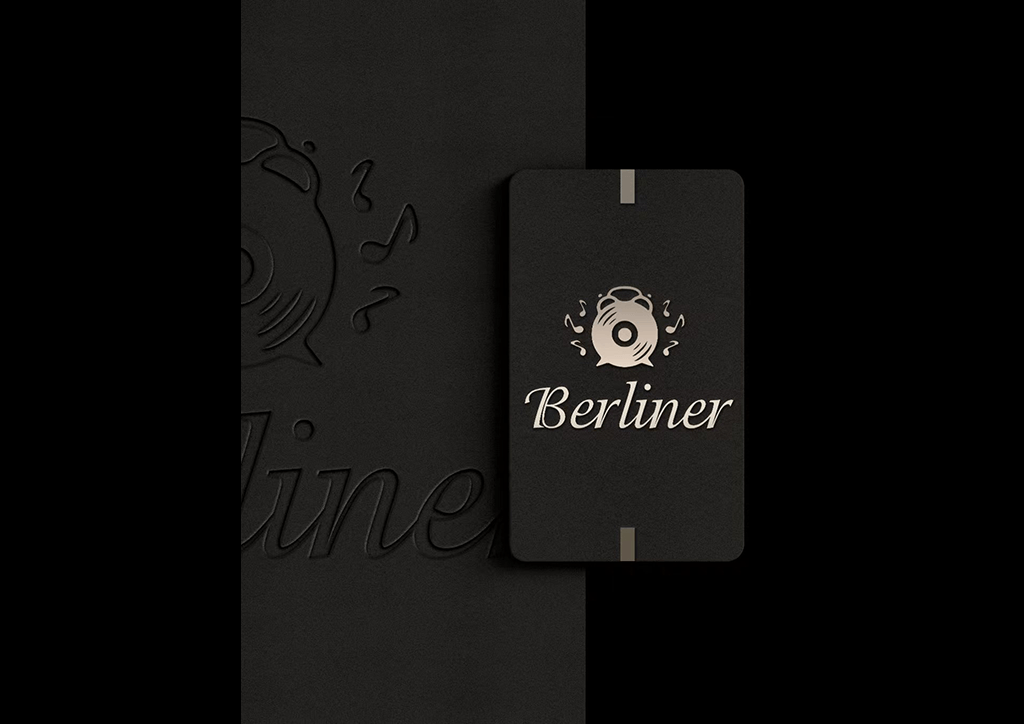 Black image with Berliner written on it and an alarm clock