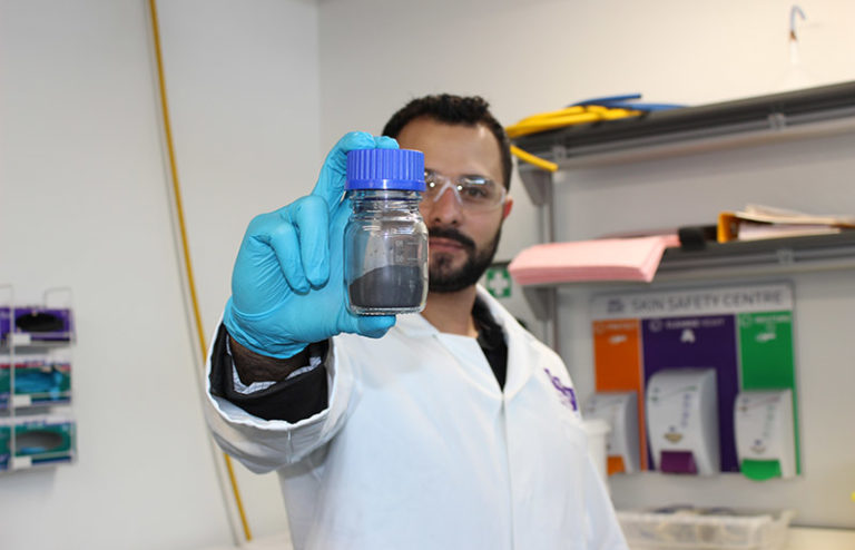 Danilo Da Silva Mariano, head of graphene research at Gerdau, showing a sampleof graphene powder in a small bottle