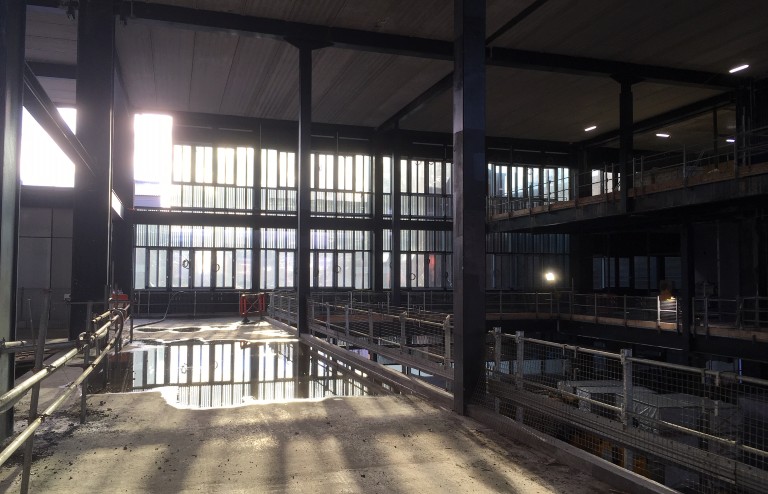 Interior view of MECD site with sun shining through windows