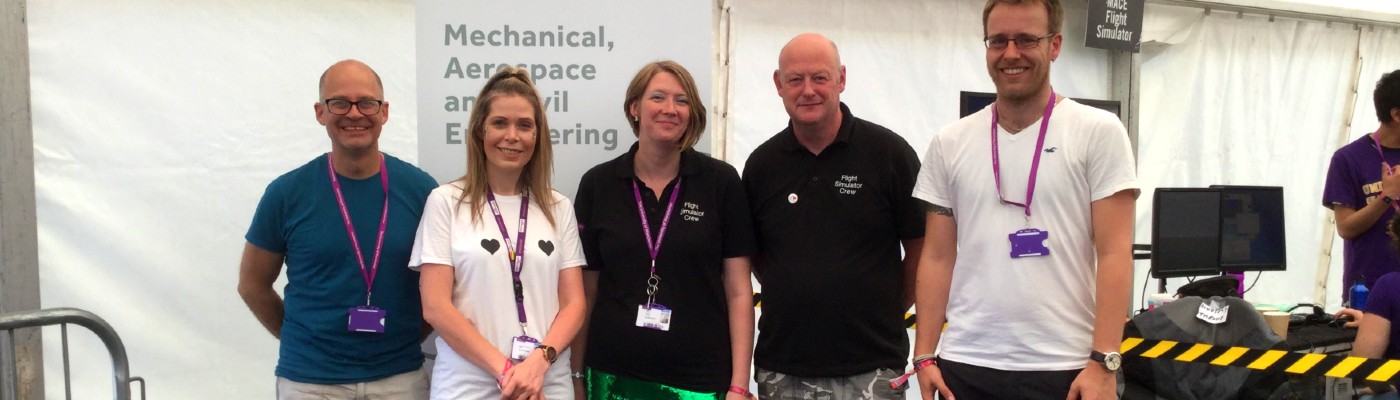 Women in engineering: Natalie Parish (centre) with MACE SR and flight sim team at Bluedot Festival