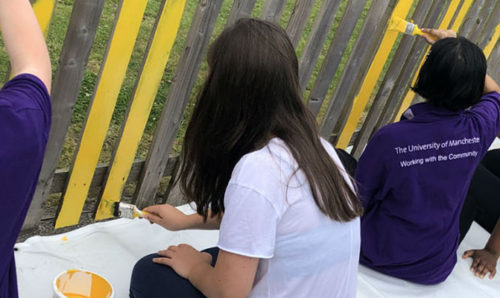 Work experience - Year 10 pupils helping to decorate Medlock Primary School