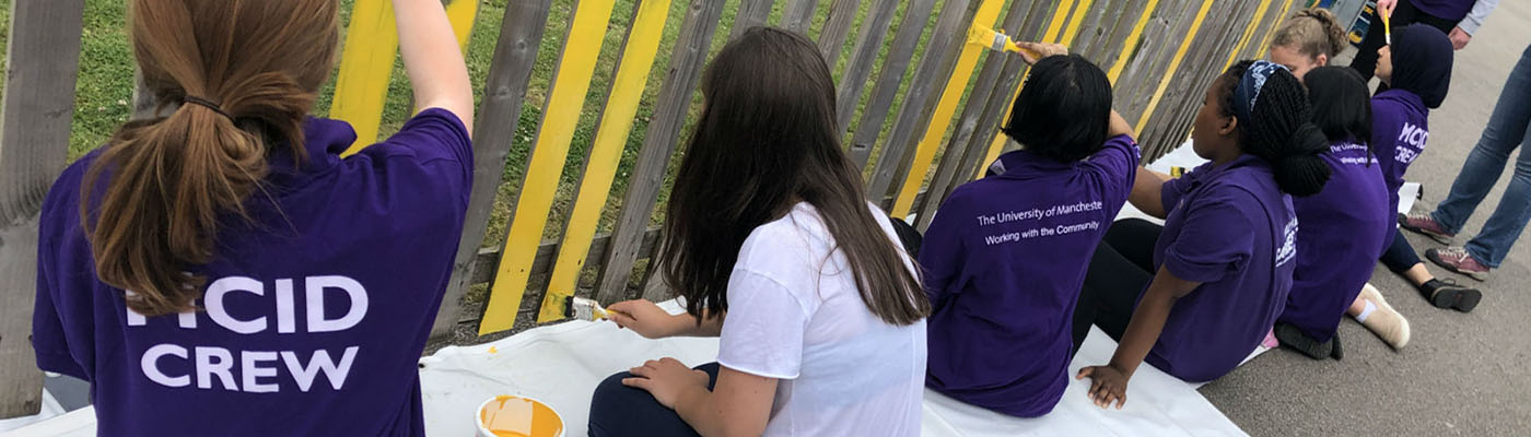 Work experience - Year 10 pupils helping to decorate Medlock Primary School