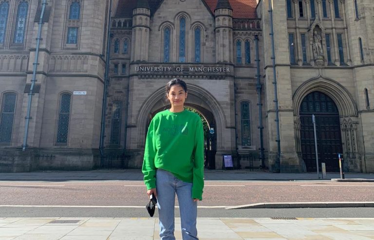 Alejandra in front of the old University Building