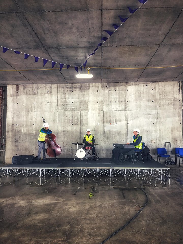 Band playing in construction site