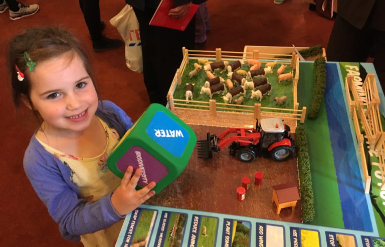 Girl at science exhibit