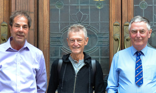 The three men outside Sackville Street Building