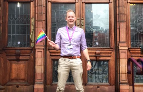 Man holding Pride flag