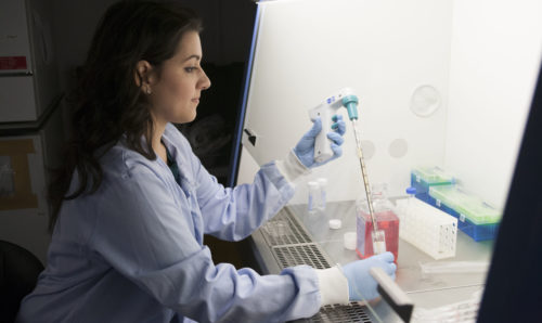 Woman scientist looking at samples