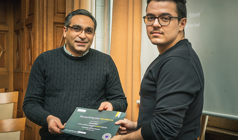 Ahmed Fakhri receives his certificate