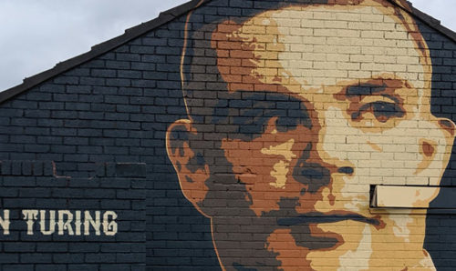 Alan Turing mural on the side of a building