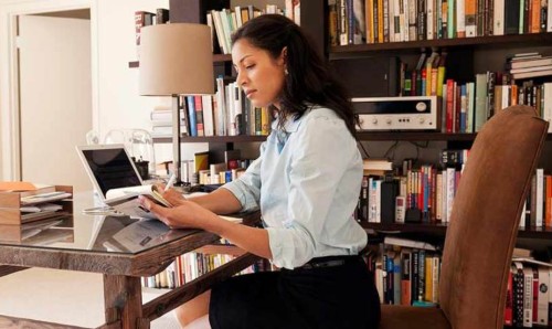 Woman working in study