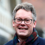 Dermot Turing in glasses and scarf