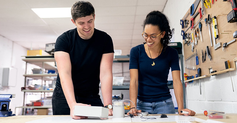 A man and woman engineer working together