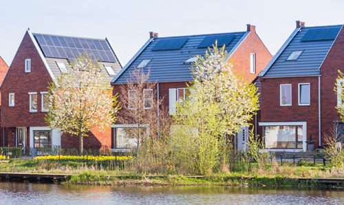 Sustainable homes by a lake