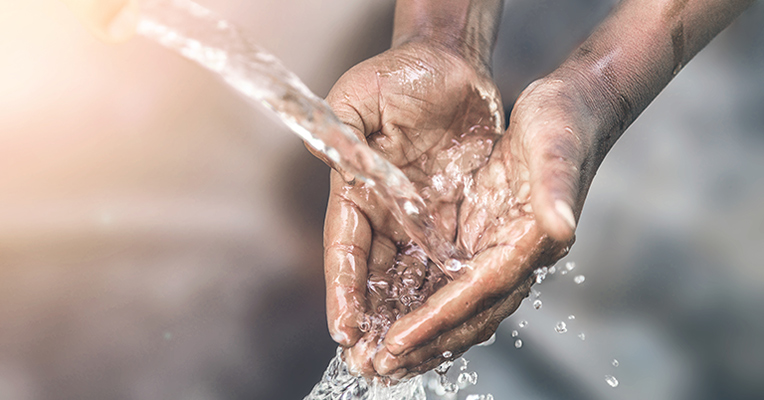 Hands washing in water