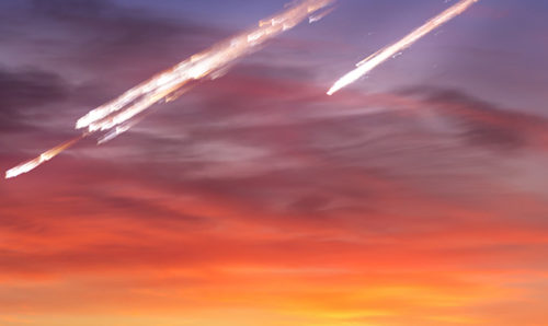 Meteorites in a colourful sky