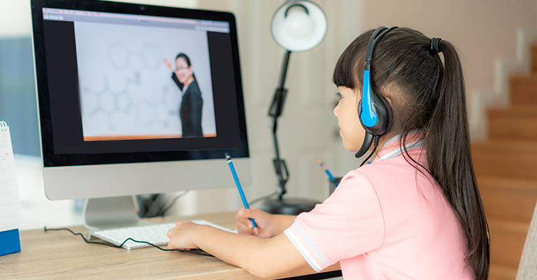 Young girl at a computer