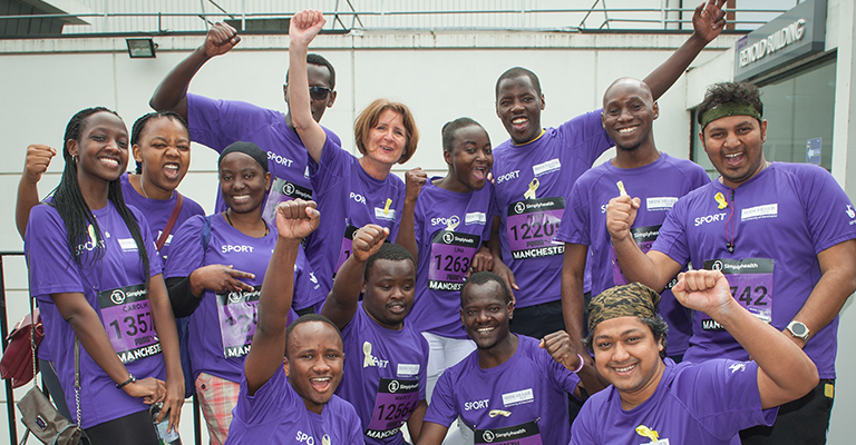 Runners in the Manchester Purple Wave