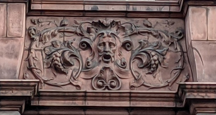Wizard-like relief on Sackville Street Building
