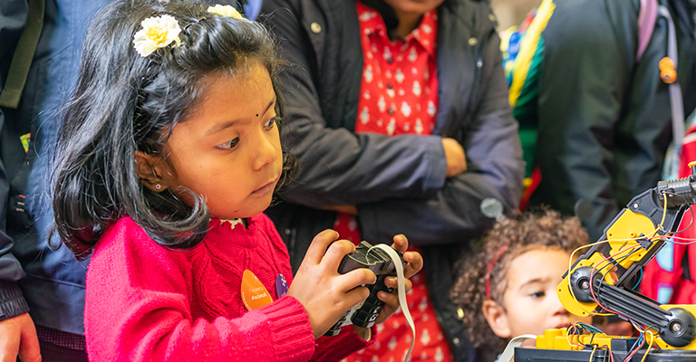 Child with remote control