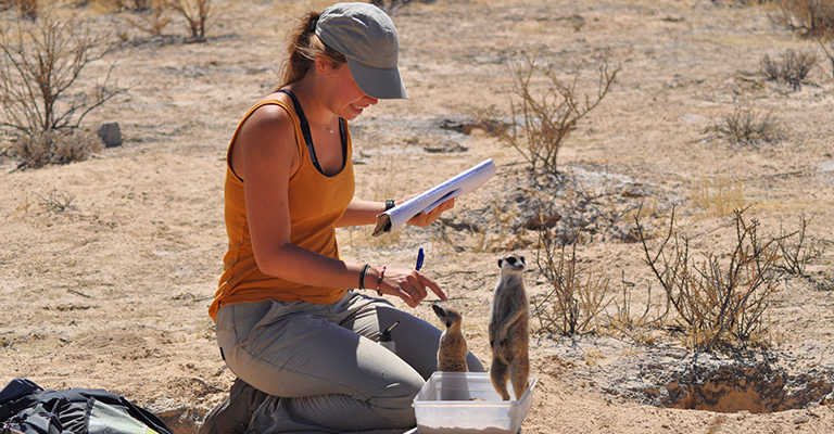 Jessica and two meerkats