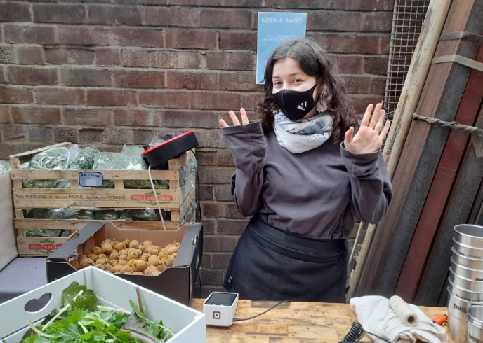 Klaudia at a market stall