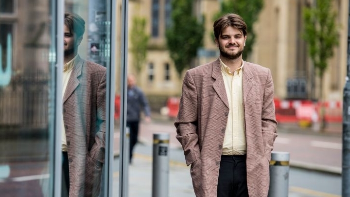 Matt standing outside University Place