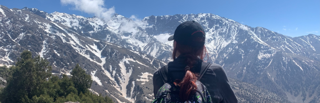 Ayesha looking out on mountains.