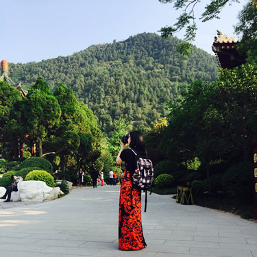 Claudia enjoying her hobby during a work trip to China